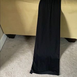 Black maxi skirt with slits on both sides.